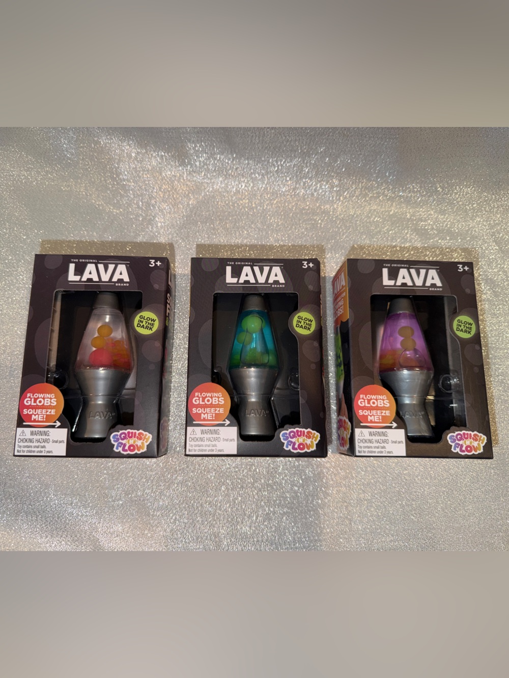 Free DeliveryOne (1) Randomly Selected One Lava Squish & Flow Mini Lamp Squishy